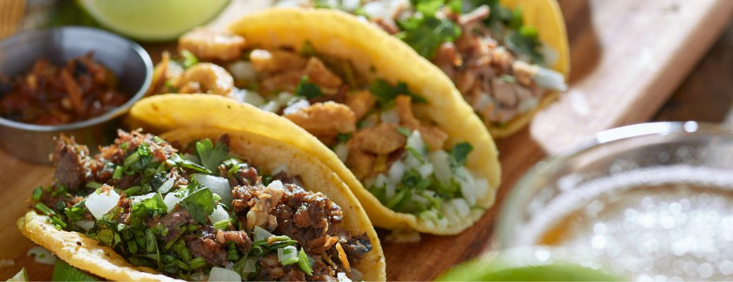 close up image of three tacos